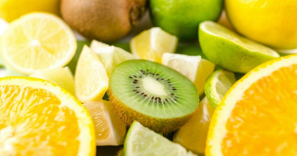 sliced oranges, kiwi and lemons all sources of vitamin c